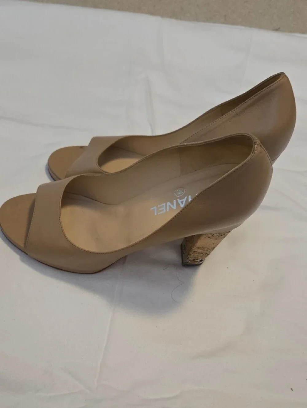 CHANEL Nude Leather Peep-Toe Pumps